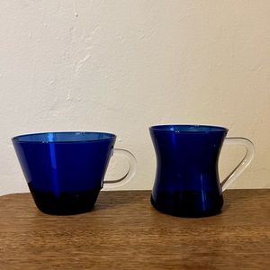 Set of blue glass mugs